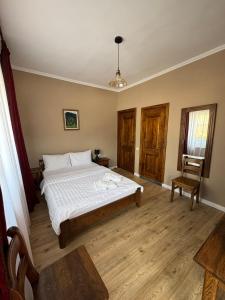 Ένα ή περισσότερα κρεβάτια σε δωμάτιο στο Pensiune Restaurant ROUTE60 +40 φωτογραφίες