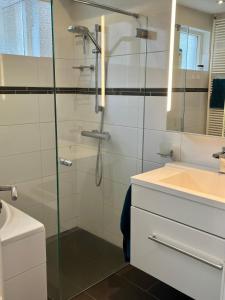 Koupelna v ubytování Familiehuis Pollux 6 personen Noordwijk aan Zee + 8 fotografií
