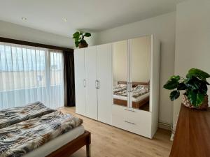 Postel nebo postele na pokoji v ubytování Familiehuis Pollux 6 personen Noordwijk aan Zee