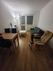 A seating area at Nocleg Jakubskie Przedmieście 3 pokoje z balkonem