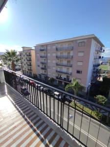 a view of a building from a balcony at Mira Beach in Praia a Mare +37 photos