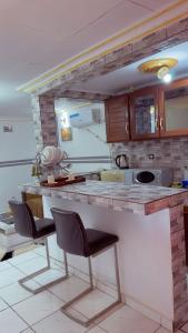 Kuchyň nebo kuchyňský kout v ubytování VIP stay in Yaoundé + 4 fotografie
