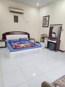 Postel nebo postele na pokoji v ubytování Mehran House