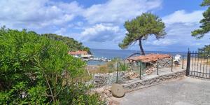 a villa with a view of the ocean at Antunovic in Veli Lošinj