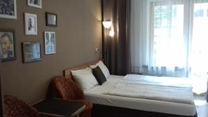 Кровать или кровати в номере BLISKO DEPTAKA - Apartamenty i Pokoje