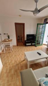 TV a/nebo společenská místnost v ubytování Lukite House