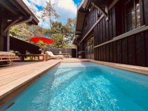 Swimmingpoolen hos eller tæt på Villa Sangla - Accès plage - Piscine - Climatisation