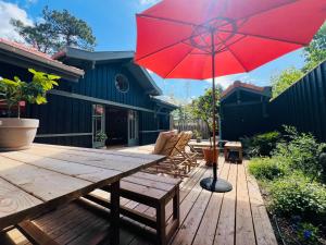 En have udenfor Villa Sangla - Accès plage - Piscine - Climatisation