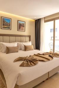 Ένα ή περισσότερα κρεβάτια σε δωμάτιο στο Residence Eden Marrakech