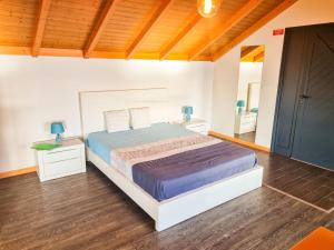 Giường trong phòng chung tại Studio One | Massapez | Fajã da Ovelha | Calheta