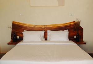 Ένα ή περισσότερα κρεβάτια σε δωμάτιο στο vrihee resort +18 φωτογραφίες