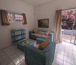 Χώρος καθιστικού στο Garden Cottage