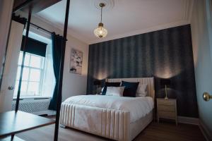 Ένα ή περισσότερα κρεβάτια σε δωμάτιο στο Bankhouse