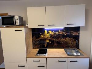 Η κουζίνα ή μικρή κουζίνα στο Ferienwohnung Steinstübchen