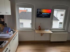 Η κουζίνα ή μικρή κουζίνα στο Ferienwohnung Steinstübchen +2 φωτογραφίες