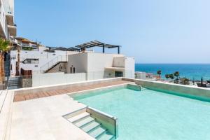 Πισίνα στο ή κοντά στο House with Private Spa and Pool, with access to Sauna and Gym