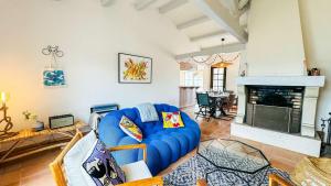 Et opholdsområde på Superbe villa avec piscine chauffée