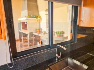 Kuchyň nebo kuchyňský kout v ubytování House of Massapez | Calheta + 47 fotografií