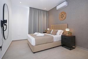 En eller flere senge i et værelse på Princess Margaret Luxury Villa + 21 billeder