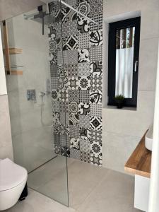 Et badeværelse på Domki Pod Lasem - Domek Bukowy + 36 billeder