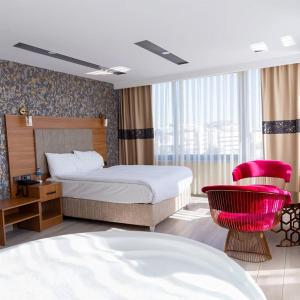 Ένα ή περισσότερα κρεβάτια σε δωμάτιο στο Golden Lux Hotel Antalya