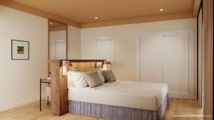 un dormitorio con una cama y un espejo en Hotel Riviera Costa del Sol - Adults Recommended, en Benalmádena