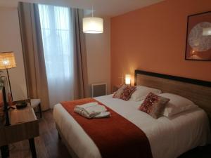 A bed or beds in a room at DOMITYS - Les Trèfles Még 10 kép