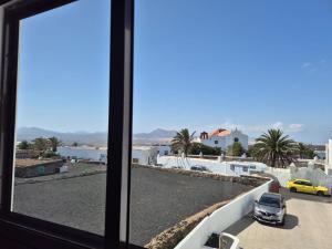 a view from a window of a parking lot at Sabbia Suites Casa Vera in Teguise