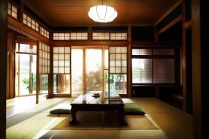 En eller flere senge i et værelse på Quiet rental house - Vacation STAY 25423v