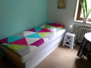 Postel nebo postele na pokoji v ubytování B&B Zur Tanne