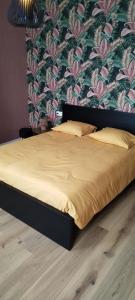 Ένα ή περισσότερα κρεβάτια σε δωμάτιο στο Wervik-94