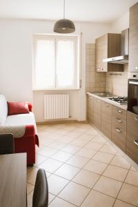 Kuchyň nebo kuchyňský kout v ubytování Madonnina House Bilocale vicino Milano, Rho Fiera e H Galeazzi + 13 fotografií