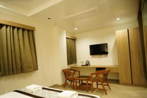 Μια τηλεόραση ή/και κέντρο ψυχαγωγίας στο V1-One Bouteeque Hotel