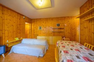 Ένα ή περισσότερα κρεβάτια σε δωμάτιο στο Casa D'Amato - Roccaraso +23 φωτογραφίες