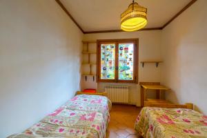 Ένα ή περισσότερα κρεβάτια σε δωμάτιο στο Casa D'Amato - Roccaraso