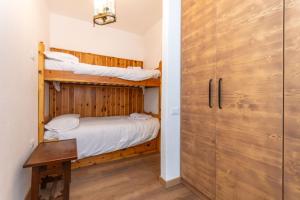 Ένα ή περισσότερα κρεβάτια σε δωμάτιο στο El Mugo-Boscoverde 1