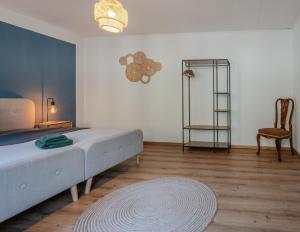 Postel nebo postele na pokoji v ubytování Spacious, stylish & central apartment, Great excursions in surrounding area + 18 fotografií