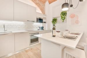 Køkken eller tekøkken på Mole Luxury Suite Torino