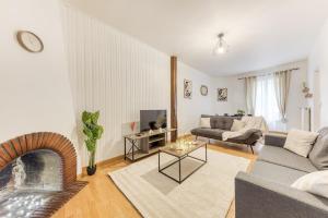 Χώρος καθιστικού στο Charmant T3 en bord de marne, centre ville proche Disneyland & Paris