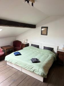 Ένα ή περισσότερα κρεβάτια σε δωμάτιο στο Nomad Home - Bronckart 10