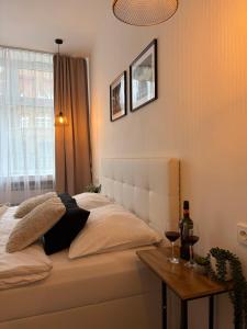 Postel nebo postele na pokoji v ubytování Morava apartmán 6 pro 3 osoby Uherské Hradiště Šafaříkova 855