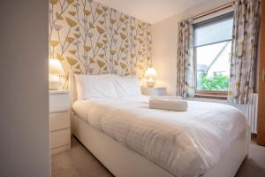 En eller flere senge i et værelse på Sparrows - Crail