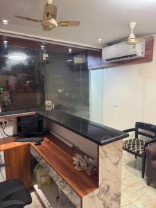 Kuchyň nebo kuchyňský kout v ubytování Hotel Royal Suites