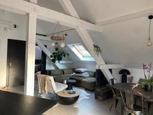 Posezení v ubytování Appartement atypique lumineux