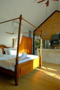 Ένα ή περισσότερα κρεβάτια σε δωμάτιο στο Fieldlight pool Villa