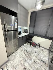 Køkken eller tekøkken på Квартира 1 комнатный