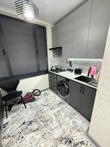 Køkken eller tekøkken på Квартира 1 комнатный