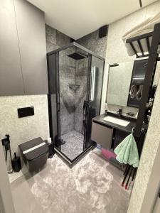 Et badeværelse på Квартира 1 комнатный