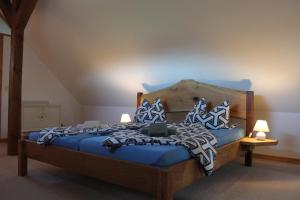 Postel nebo postele na pokoji v ubytování Villa Landidyll mit wunderschönem-seperatem Wellnessbereich