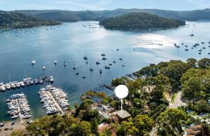 an aerial view of a harbor with boats in the water at BlueWater Penthouse Guest Suite 3 in Newport +5 photos